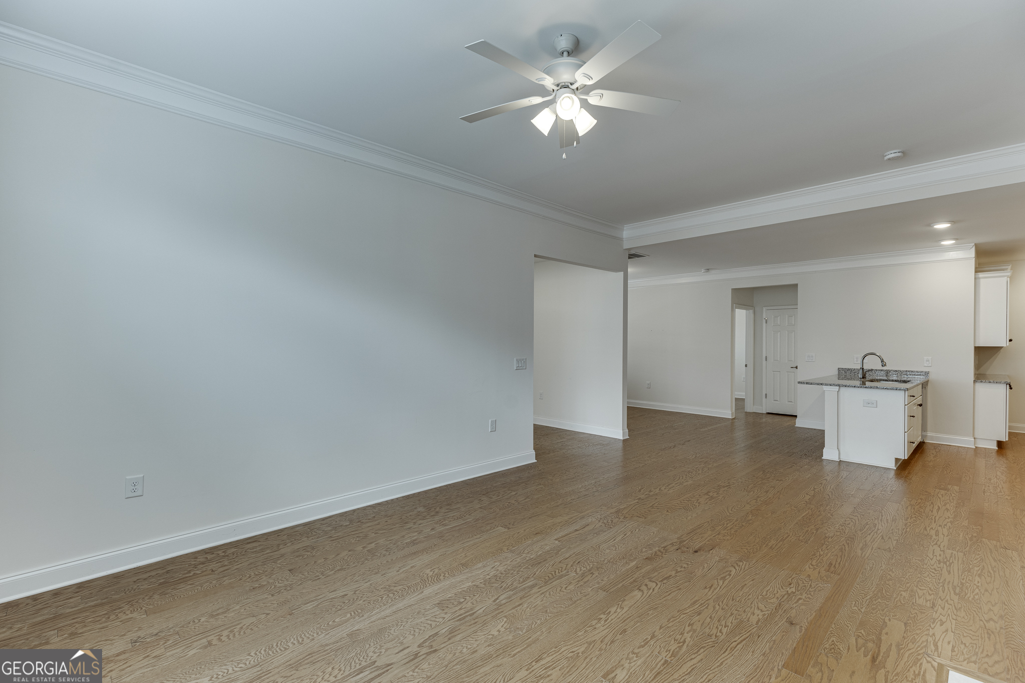 3765 Ridgehurst Drive Buford, GA 30518 - Photo 10 of 44 Expansive main living space with hardwood floors and open flow.