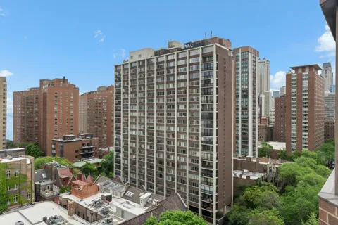 a view of a city with tall buildings