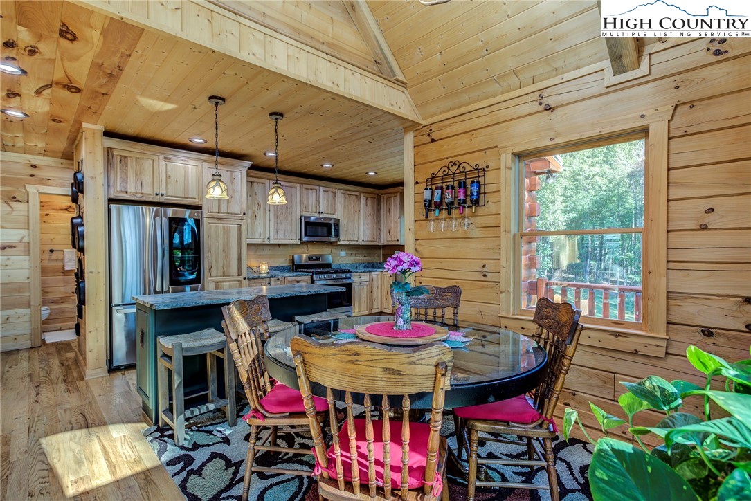 3460 South Center Church Road Thurmond, NC 28683 - Photo 25 of 50 a view of a dining tables and chairs in a patio