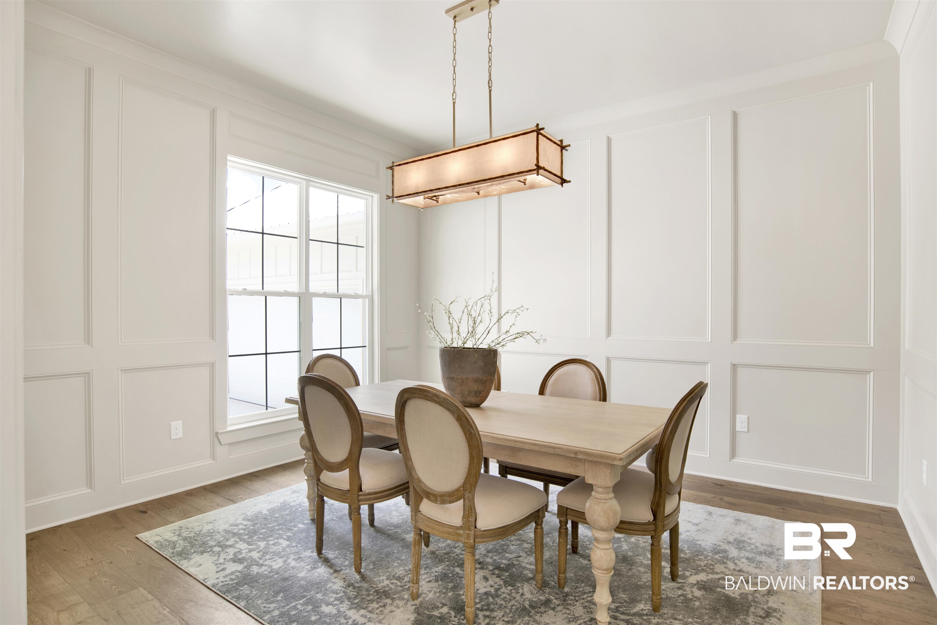 9275 Clarke Ridge Road Foley, AL 36535 - Photo 8 of 43 Dining room with a decorative wall and wood finished floors