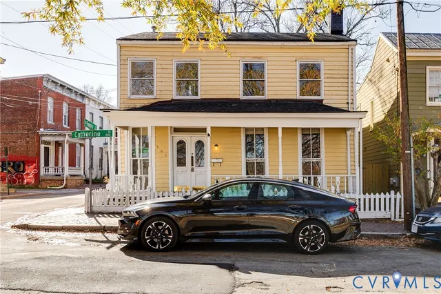 a car parked in front of a house