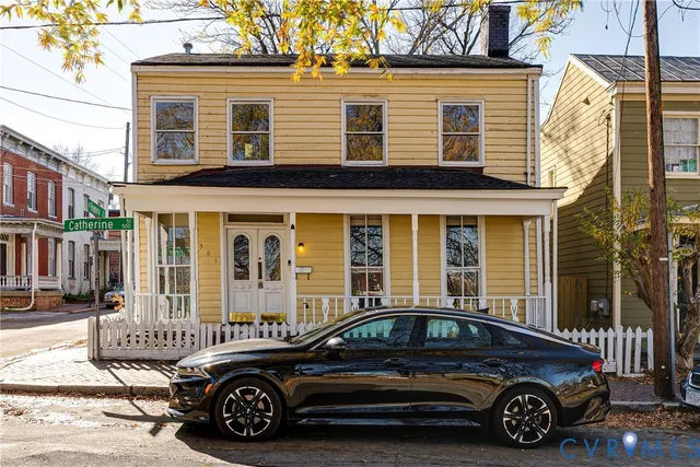a car parked in front of a house