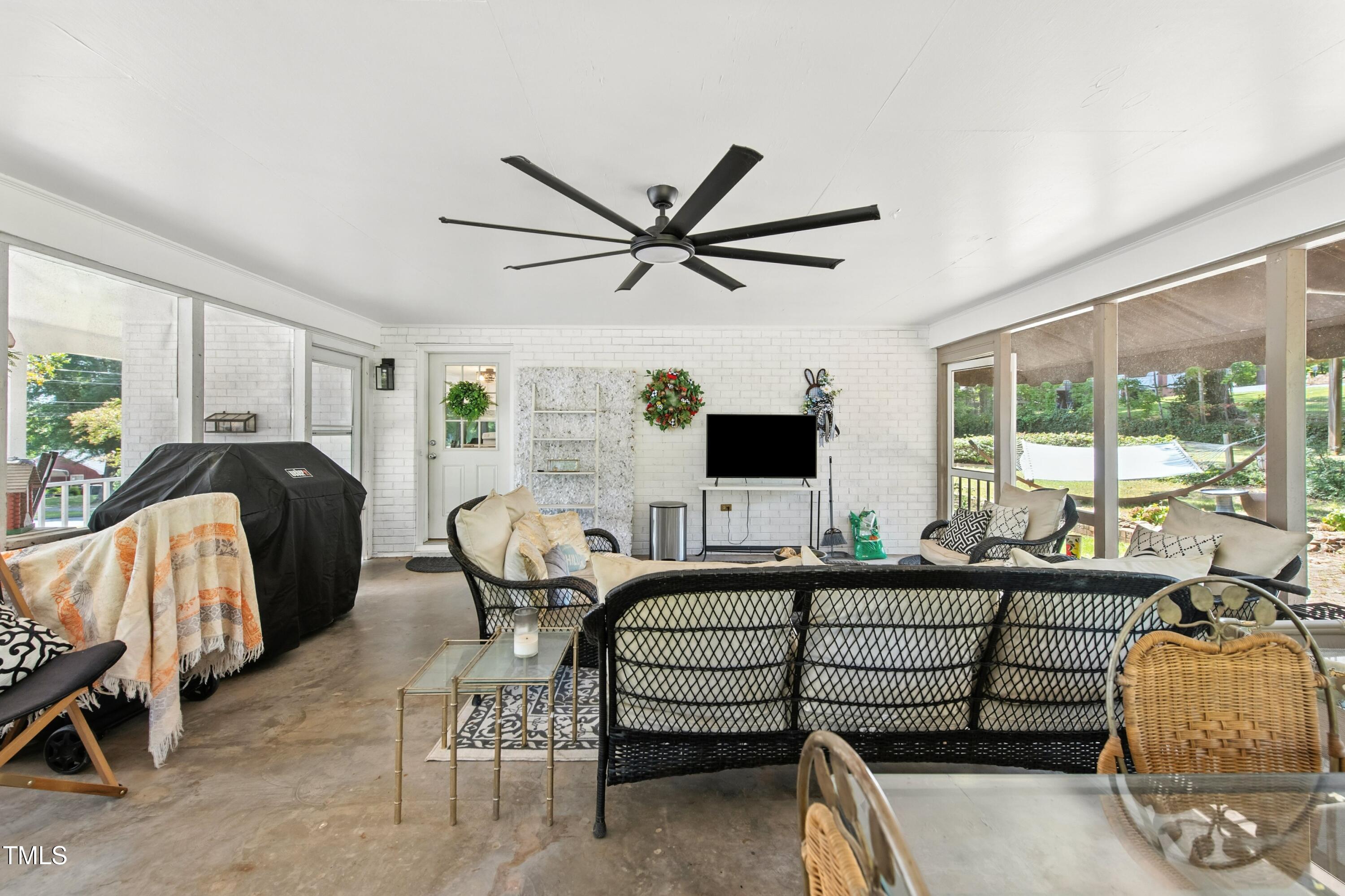 222 Gardiner Road Asheboro, NC 27203 - Photo 13 of 32 a living room with furniture and a large window