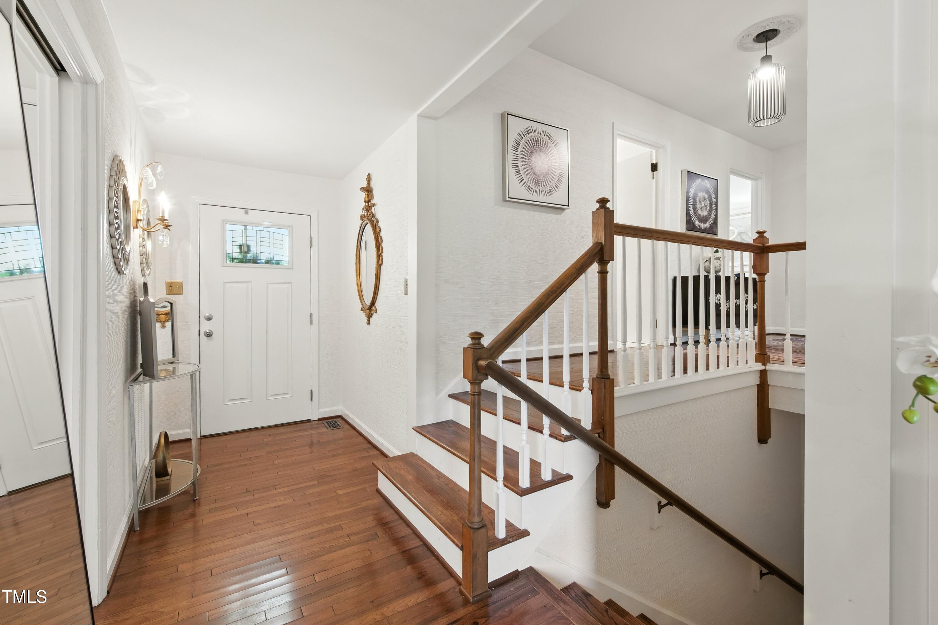 222 Gardiner Road Asheboro, NC 27203 - Photo 17 of 32 a view of entryway with stairs and wooden floor