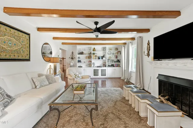 a kitchen with a sink cabinets and window