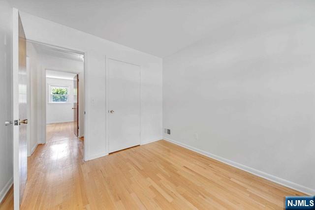 516 Knickerbocker Road Cresskill, NJ 07626 - Photo 20 of 31 a view of empty room with wooden floor