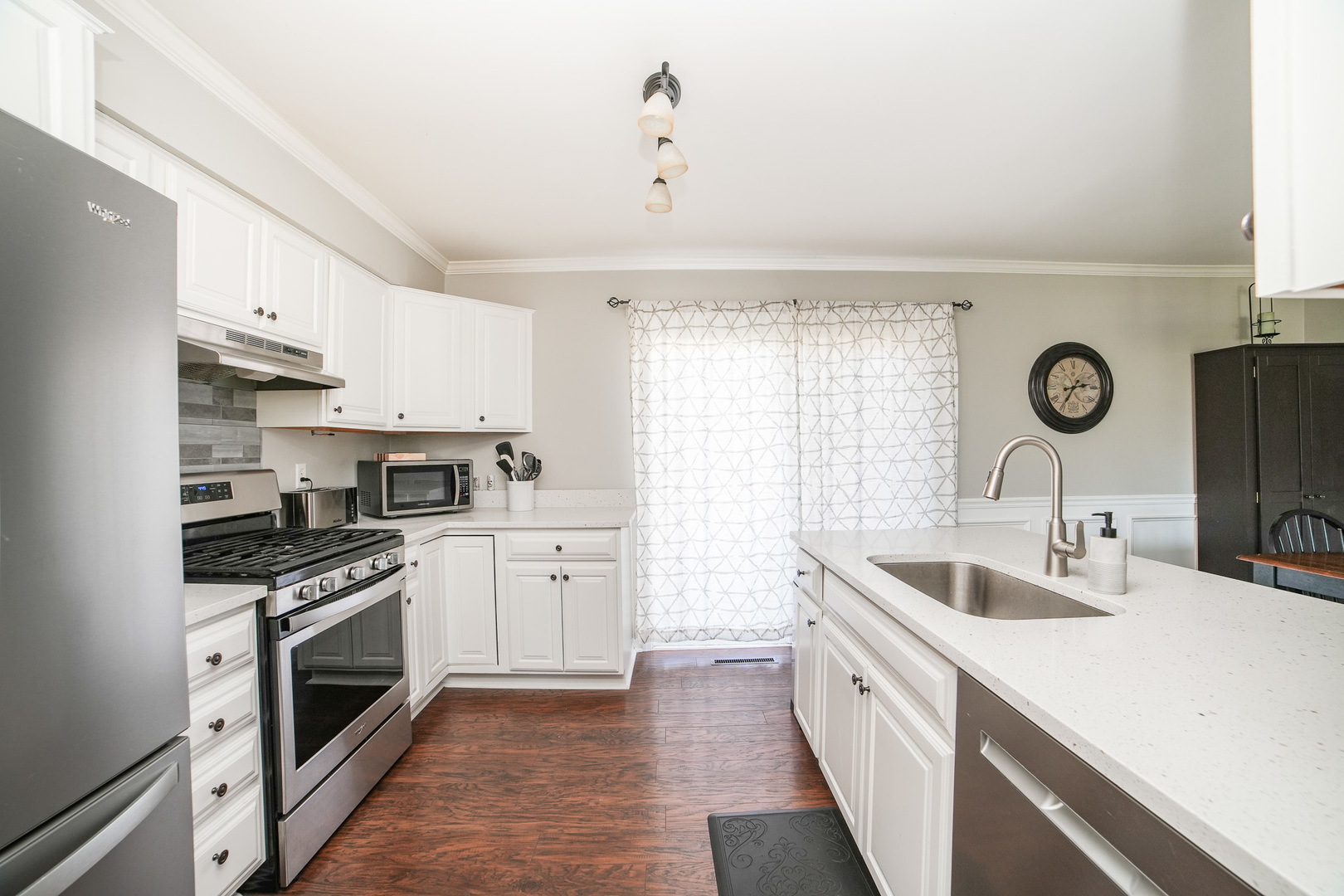 281 Kathy Drive Bourbonnais, IL 60914 - Photo 14 of 43 a large kitchen with a stove top oven