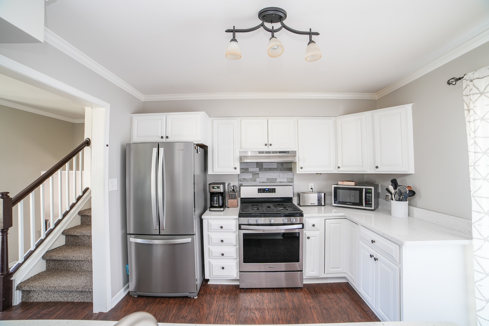 281 Kathy Drive Bourbonnais, IL 60914 - Photo 16 of 43 a kitchen with stainless steel appliances a refrigerator sink and cabinets