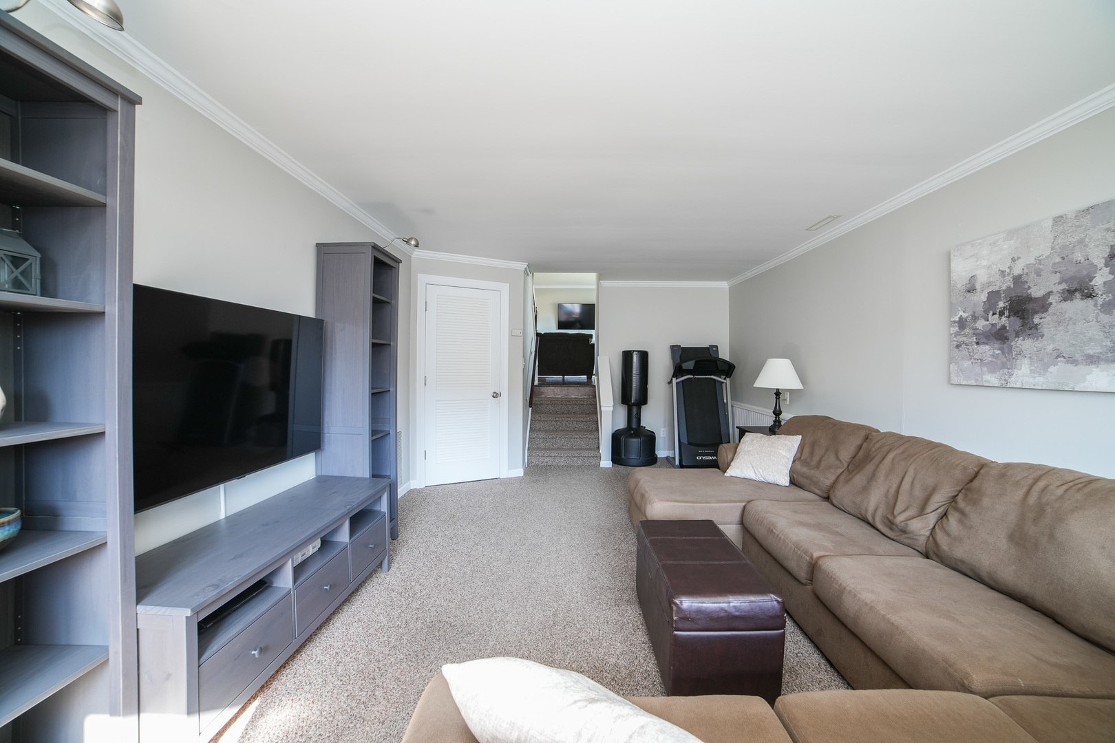 281 Kathy Drive Bourbonnais, IL 60914 - Photo 26 of 43 a living room with furniture and a flat screen tv