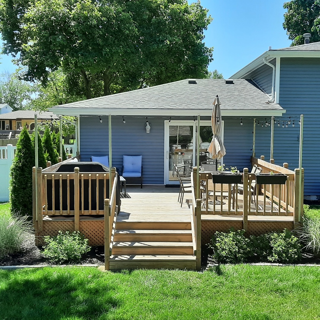 281 Kathy Drive Bourbonnais, IL 60914 - Photo 34 of 43 a front view of a house with a garden and porch