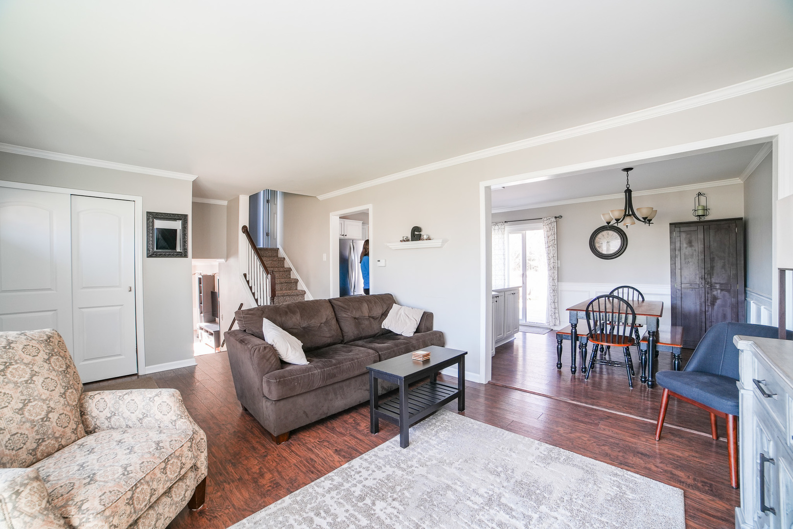 281 Kathy Drive Bourbonnais, IL 60914 - Photo 6 of 43 a living room with furniture wooden floor and a chandelier