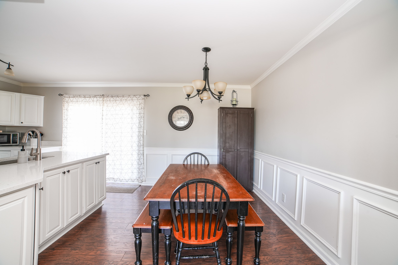281 Kathy Drive Bourbonnais, IL 60914 - Photo 10 of 43 a view of a hallway with a chandelier furniture and windows