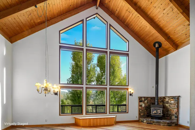 a kitchen that has a sink and a stove in it