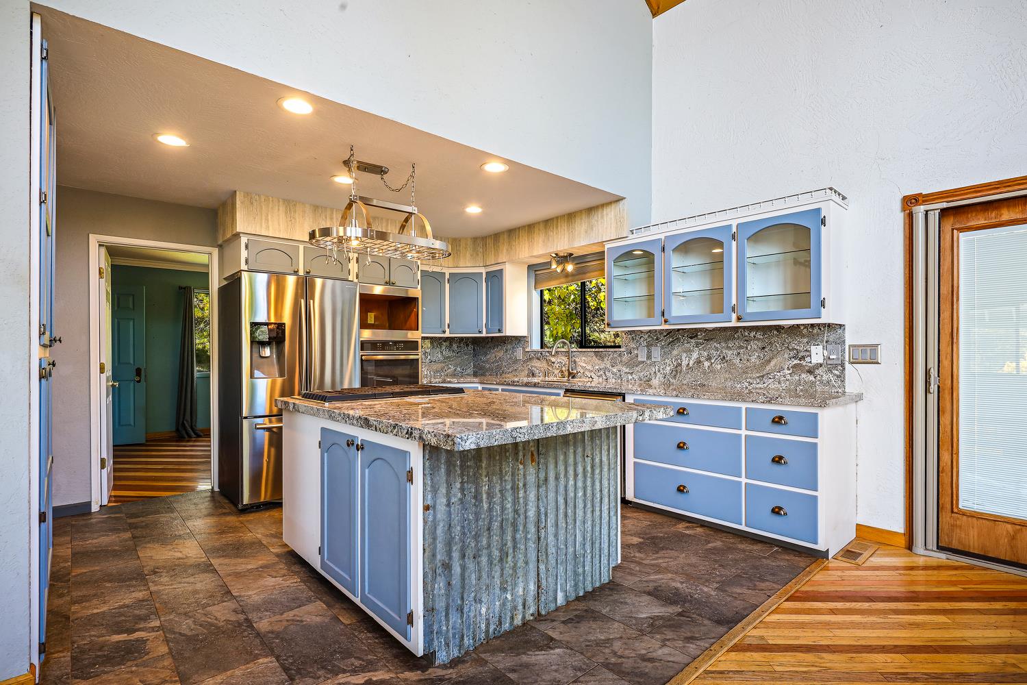 6612 Michel Road Mountain Ranch, CA 95246 - Photo 16 of 78 a kitchen with stainless steel appliances granite countertop a stove and a sink