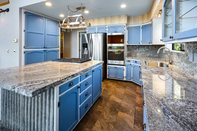 a bathroom with a toilet sink and shower