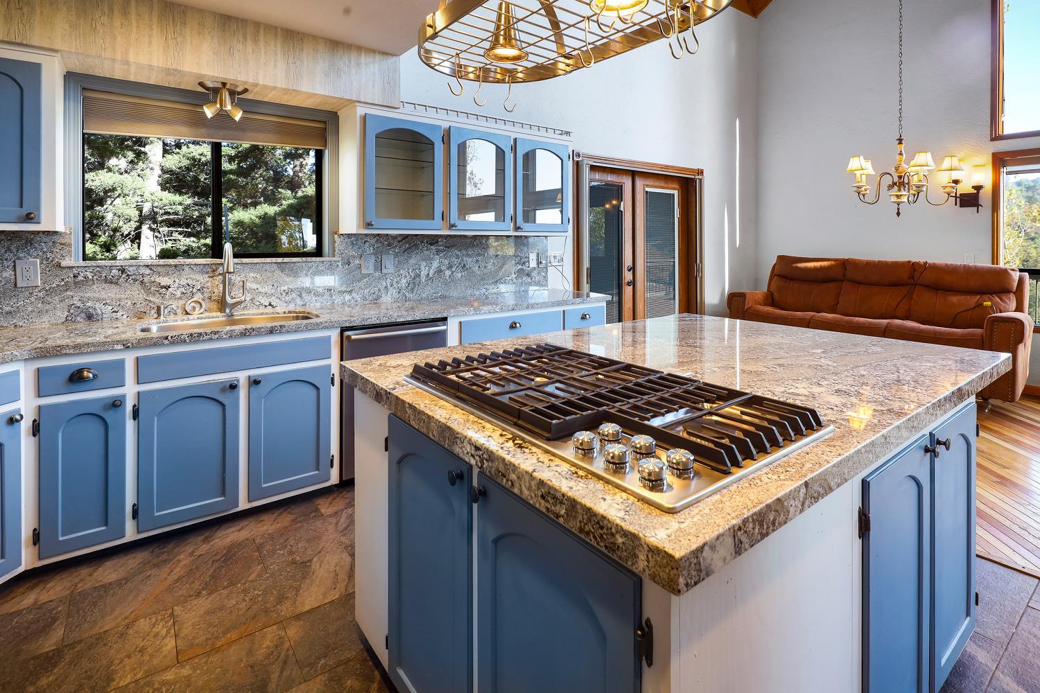 6612 Michel Road Mountain Ranch, CA 95246 - Photo 20 of 78 a kitchen that has a sink and a stove in it