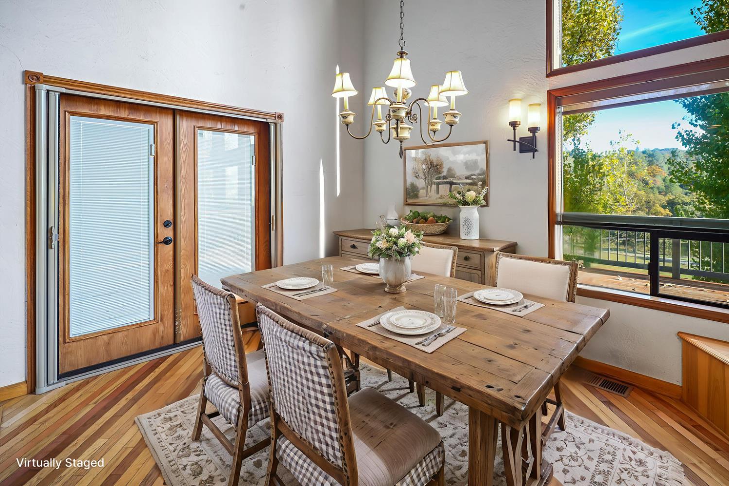 6612 Michel Road Mountain Ranch, CA 95246 - Photo 22 of 78 a view of a dining room with furniture window and wooden floor