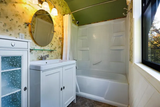 a view of a yard with swimming pool