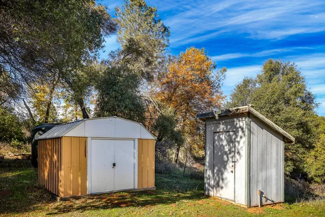 a aerial view of a house with swimming pool