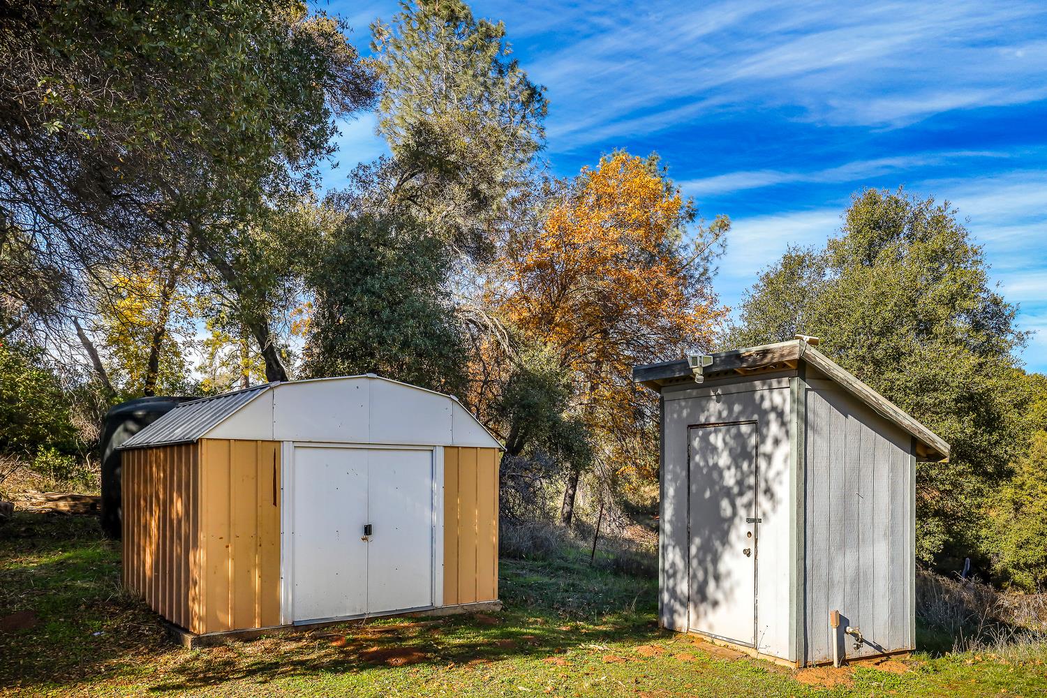 6612 Michel Road Mountain Ranch, CA 95246 - Photo 44 of 78 a front view of a house with garden