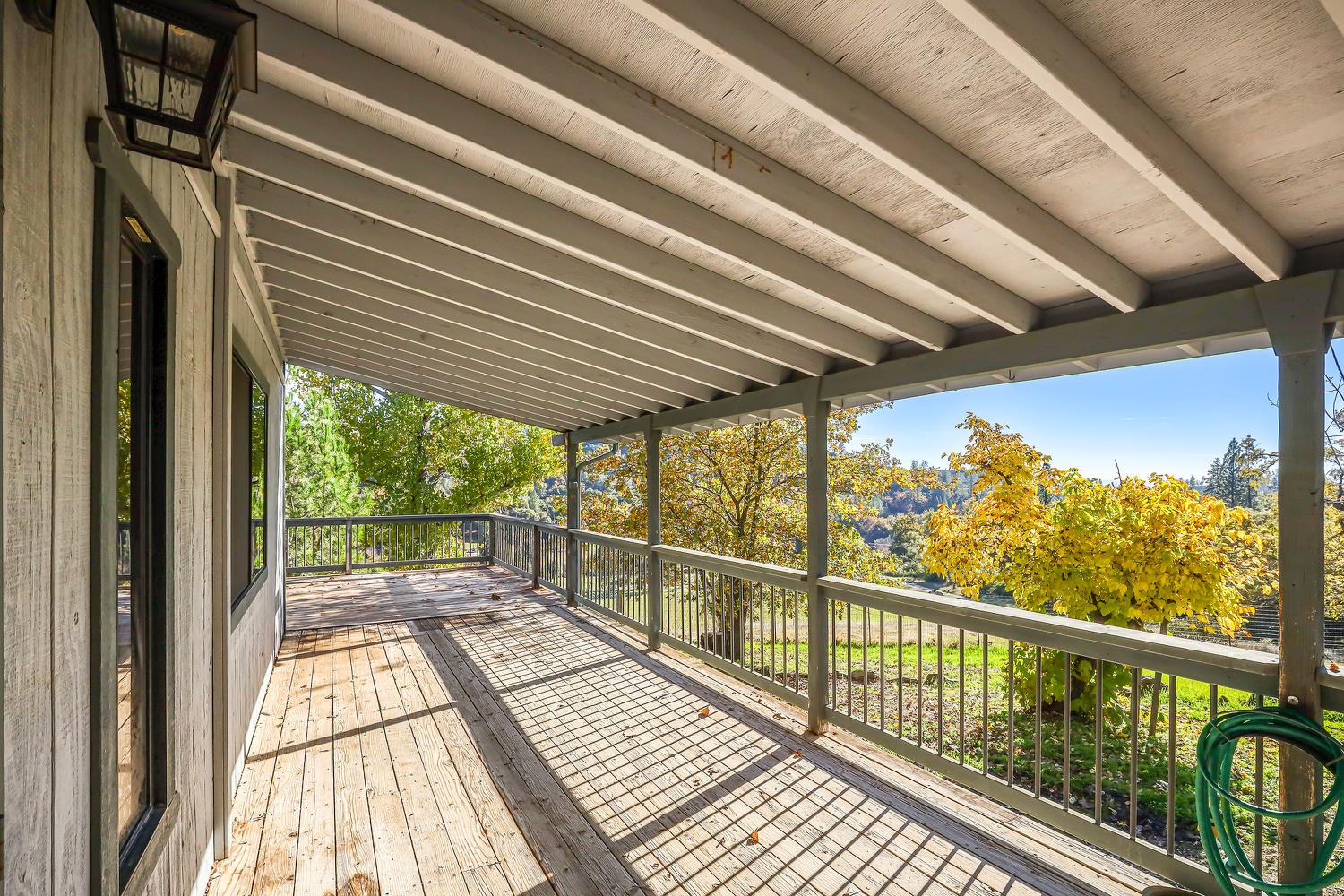 6612 Michel Road Mountain Ranch, CA 95246 - Photo 5 of 78 a view of a balcony with wooden floor