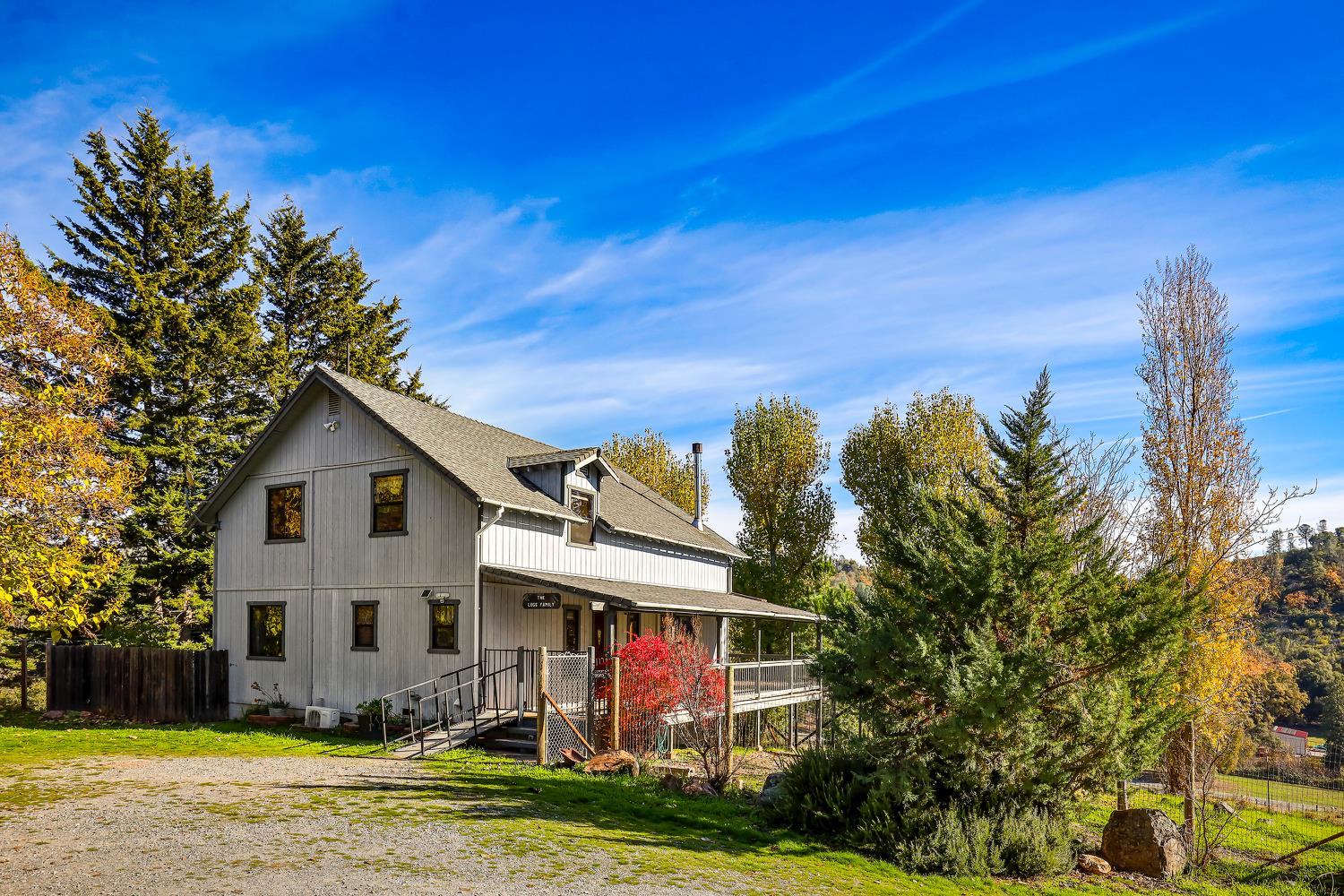 6612 Michel Road Mountain Ranch, CA 95246 - Photo 58 of 78 a front view of a house with garden