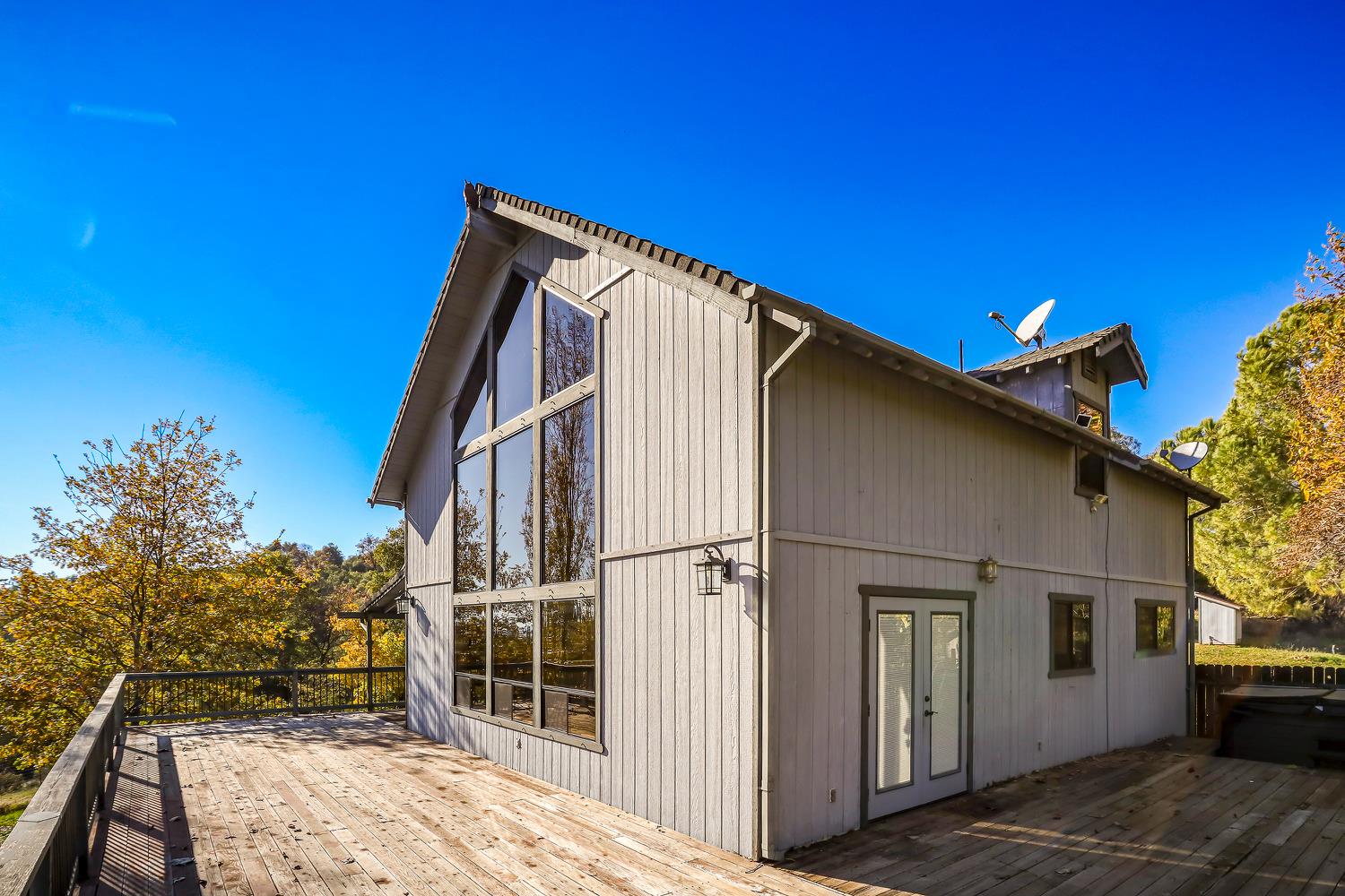 6612 Michel Road Mountain Ranch, CA 95246 - Photo 62 of 78 a backyard of a house with seating space