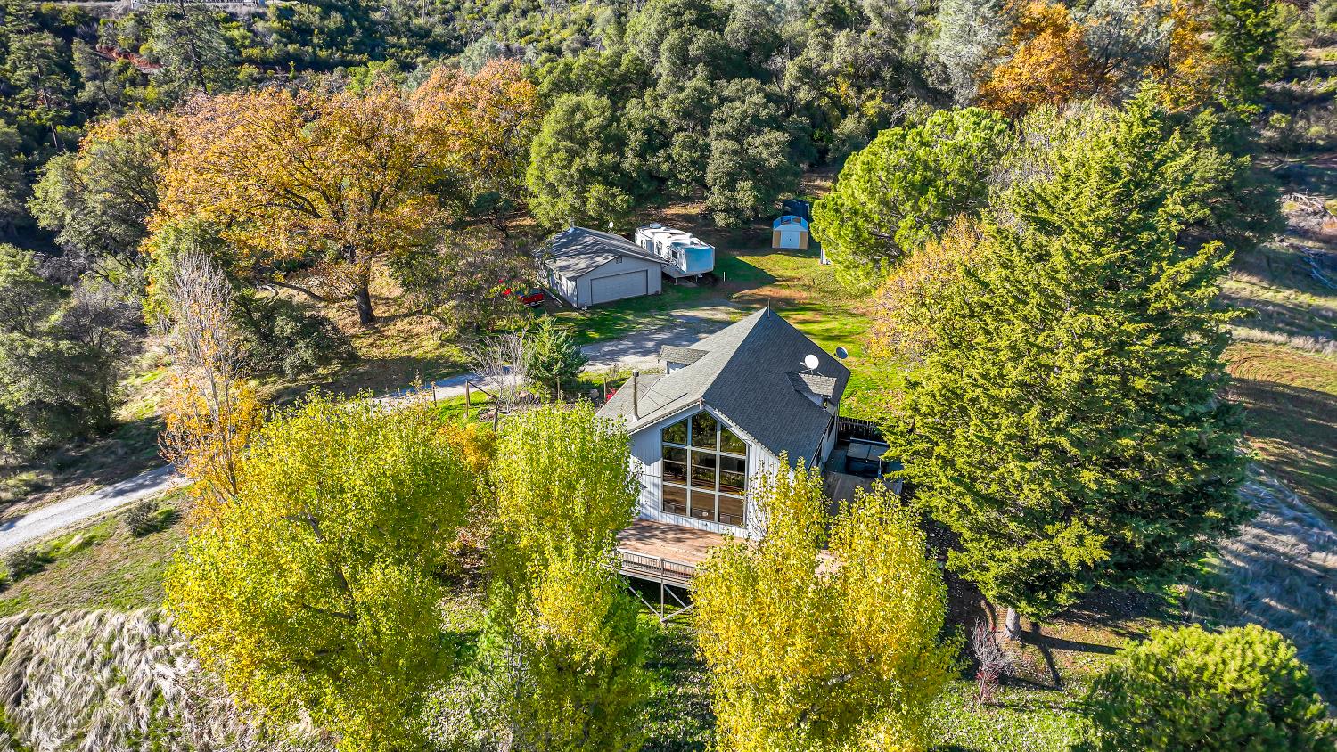 6612 Michel Road Mountain Ranch, CA 95246 - Photo 67 of 78 a aerial view of a house with swimming pool
