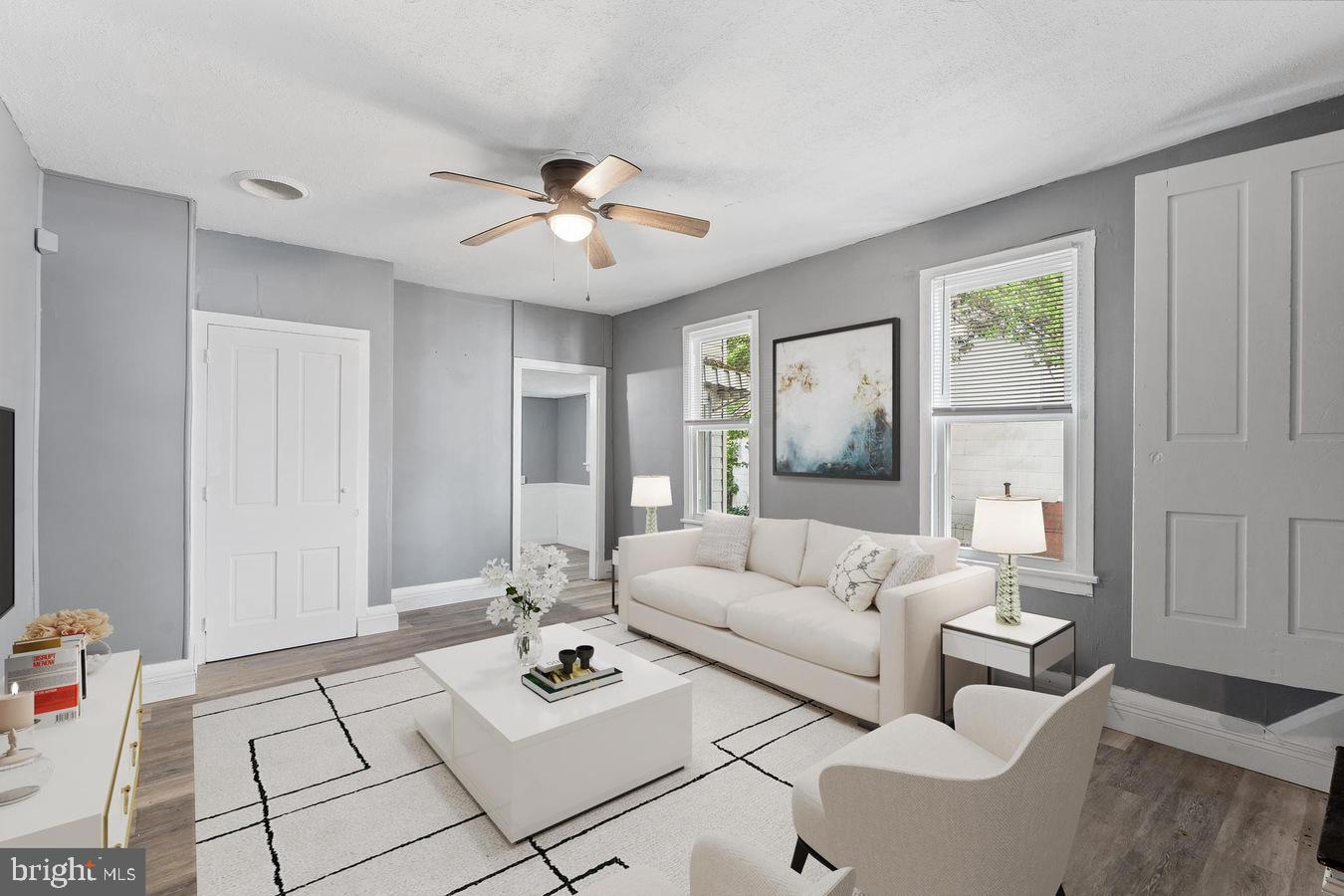 210 Church Street Salem, NJ 08079 - Photo 24 of 35 a living room with furniture and a window