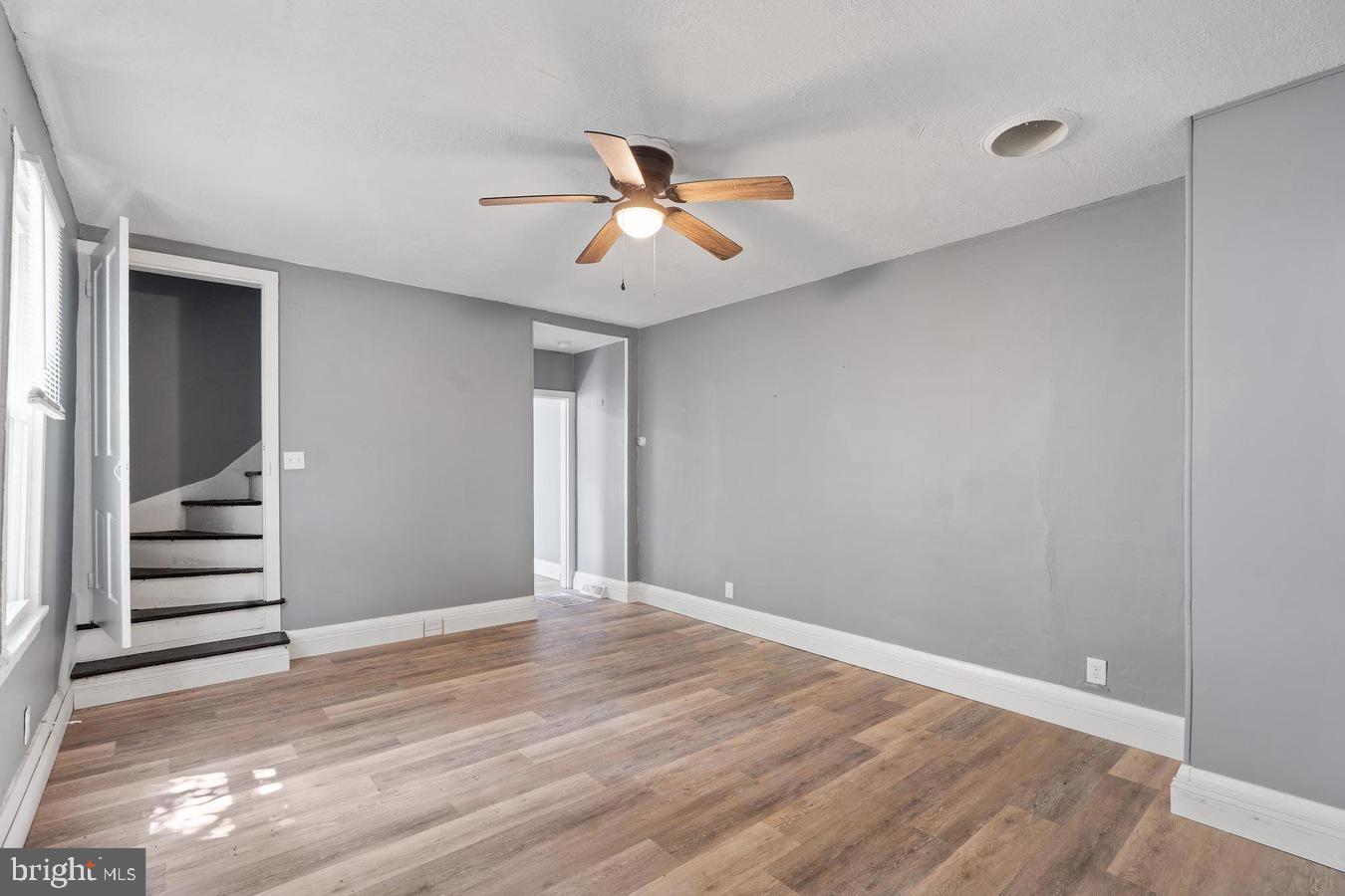 210 Church Street Salem, NJ 08079 - Photo 25 of 35 wooden floor in an empty room with a window