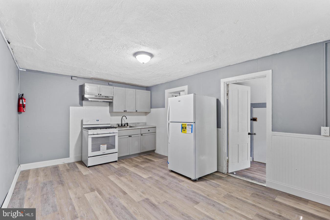 210 Church Street Salem, NJ 08079 - Photo 26 of 35 a kitchen with stainless steel appliances a refrigerator sink and stove