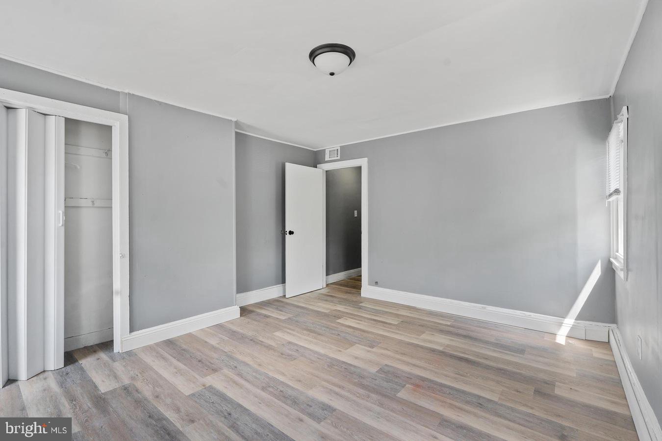 210 Church Street Salem, NJ 08079 - Photo 35 of 35 a view of an empty room with wooden floor