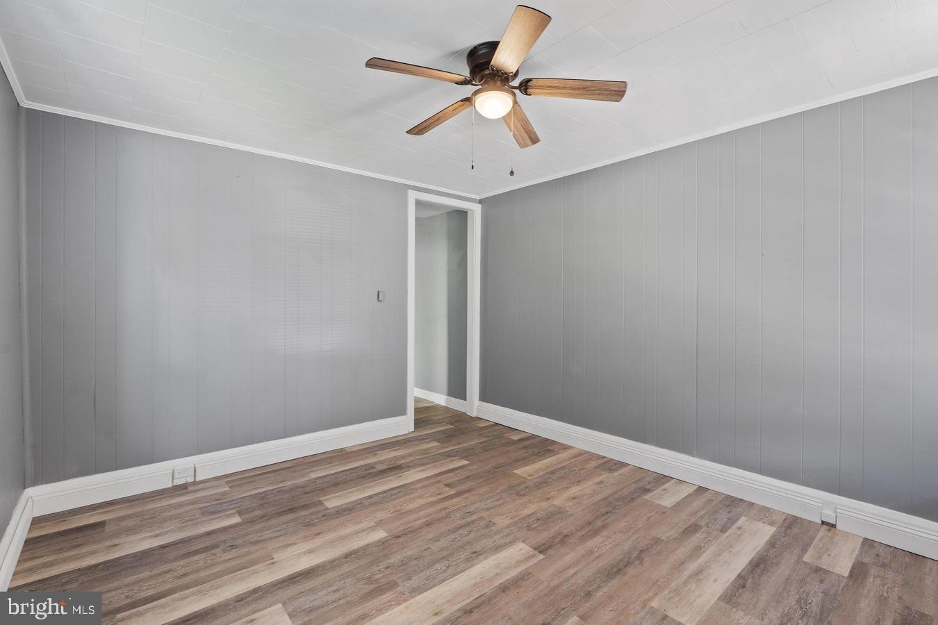 210 Church Street Salem, NJ 08079 - Photo 4 of 35 wooden floor in a empty room
