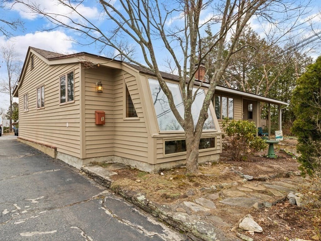 1 Meadowbrook Road Hudson, MA 01749 - Photo 1 of 36 a house view with a outdoor space