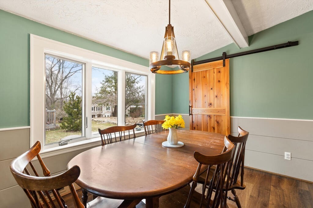 1 Meadowbrook Road Hudson, MA 01749 - Photo 21 of 36 a view of a dining room with furniture window and outside view