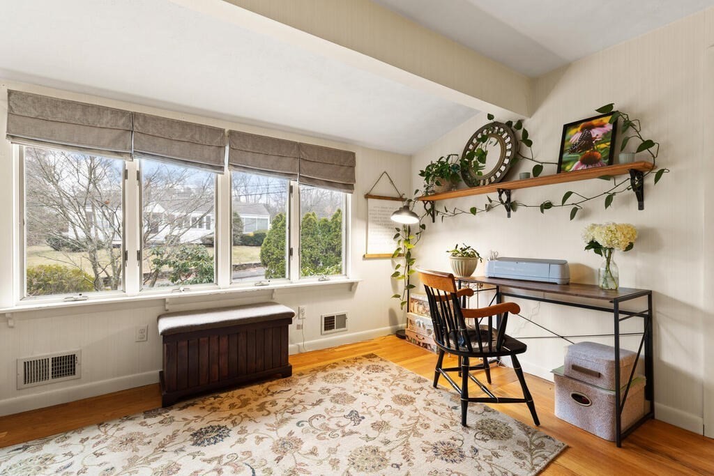 1 Meadowbrook Road Hudson, MA 01749 - Photo 6 of 36 a view of a dining room with furniture window and outside view