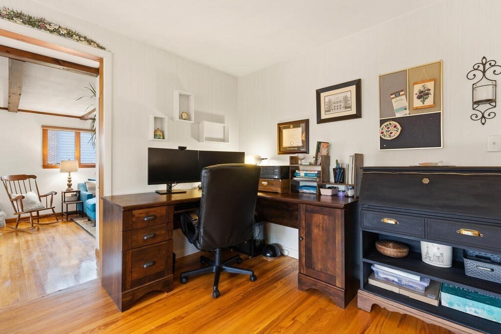 1 Meadowbrook Road Hudson, MA 01749 - Photo 7 of 36 a view of a workspace with furniture and a window