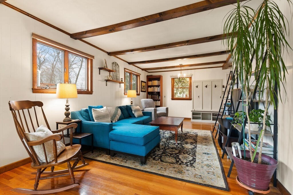 1 Meadowbrook Road Hudson, MA 01749 - Photo 9 of 36 a living room with furniture and a potted plant
