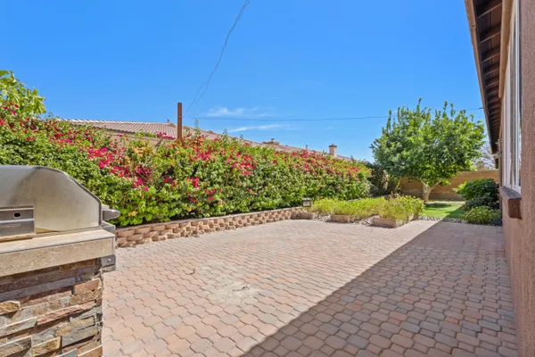 a house view with a garden space
