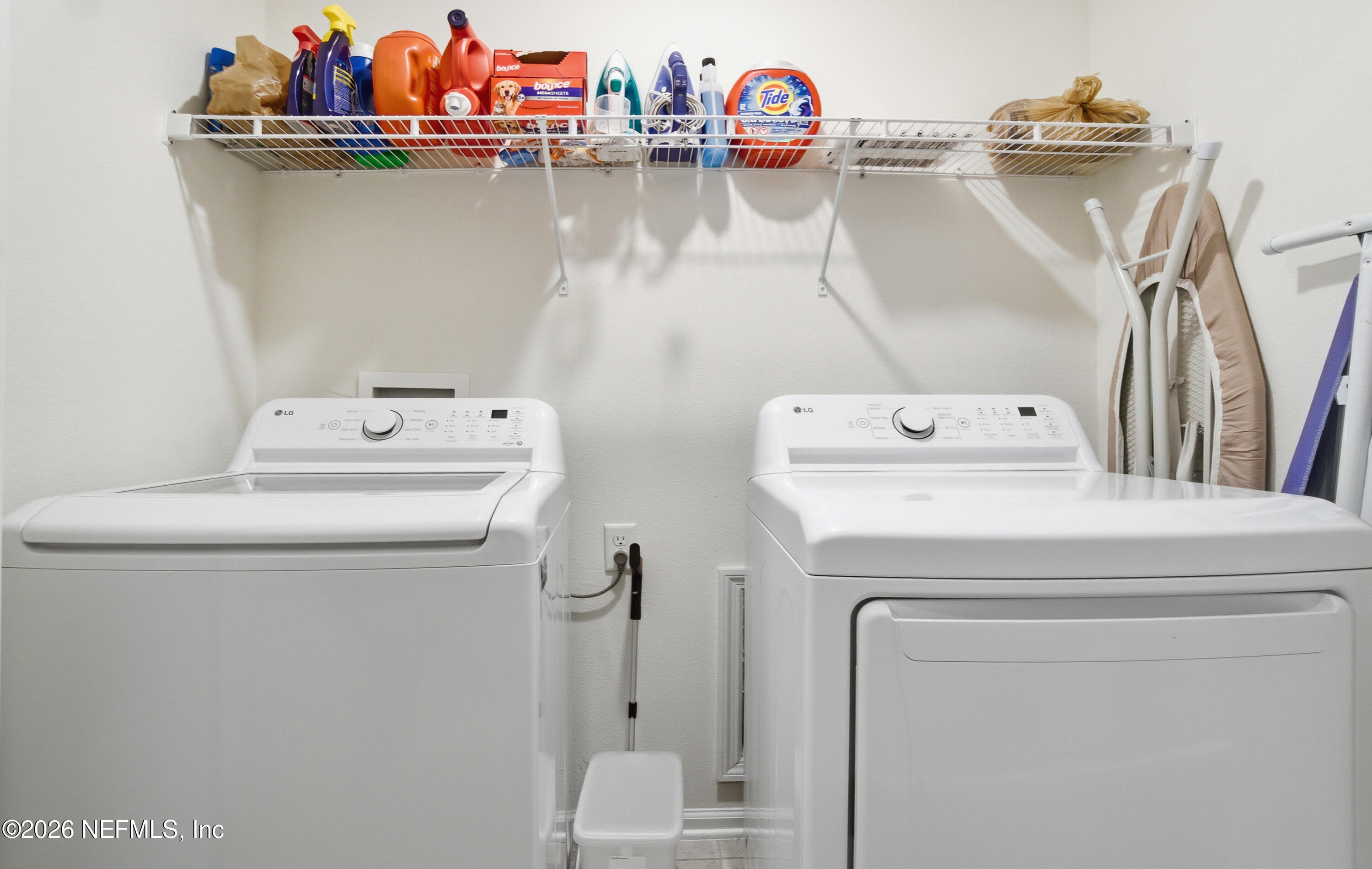 7662 Merchants Way Jacksonville, FL 32222 - Photo 17 of 32 a utility room with dryer and washer