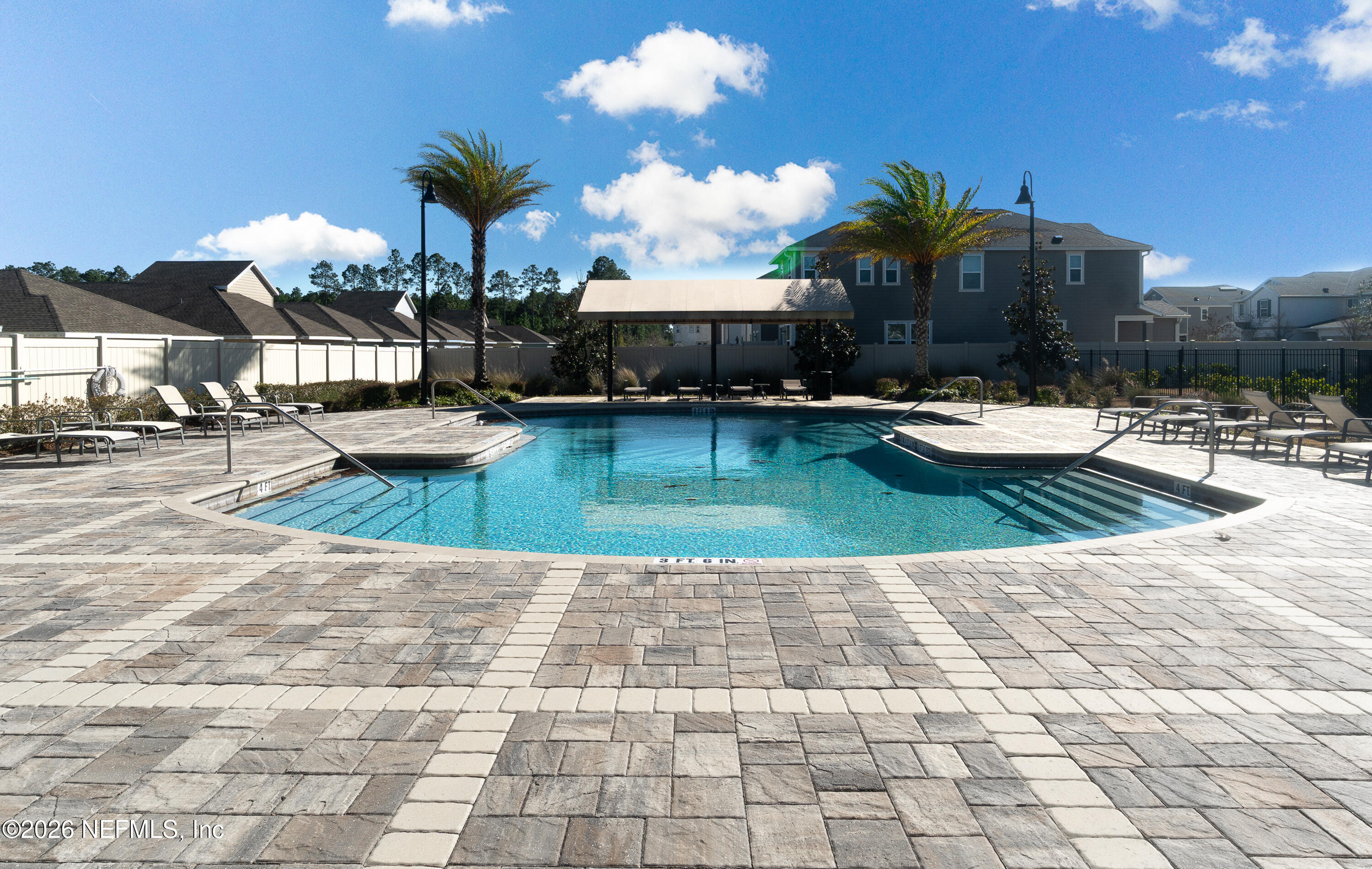 7662 Merchants Way Jacksonville, FL 32222 - Photo 28 of 32 a view of a house with swimming pool and sitting area