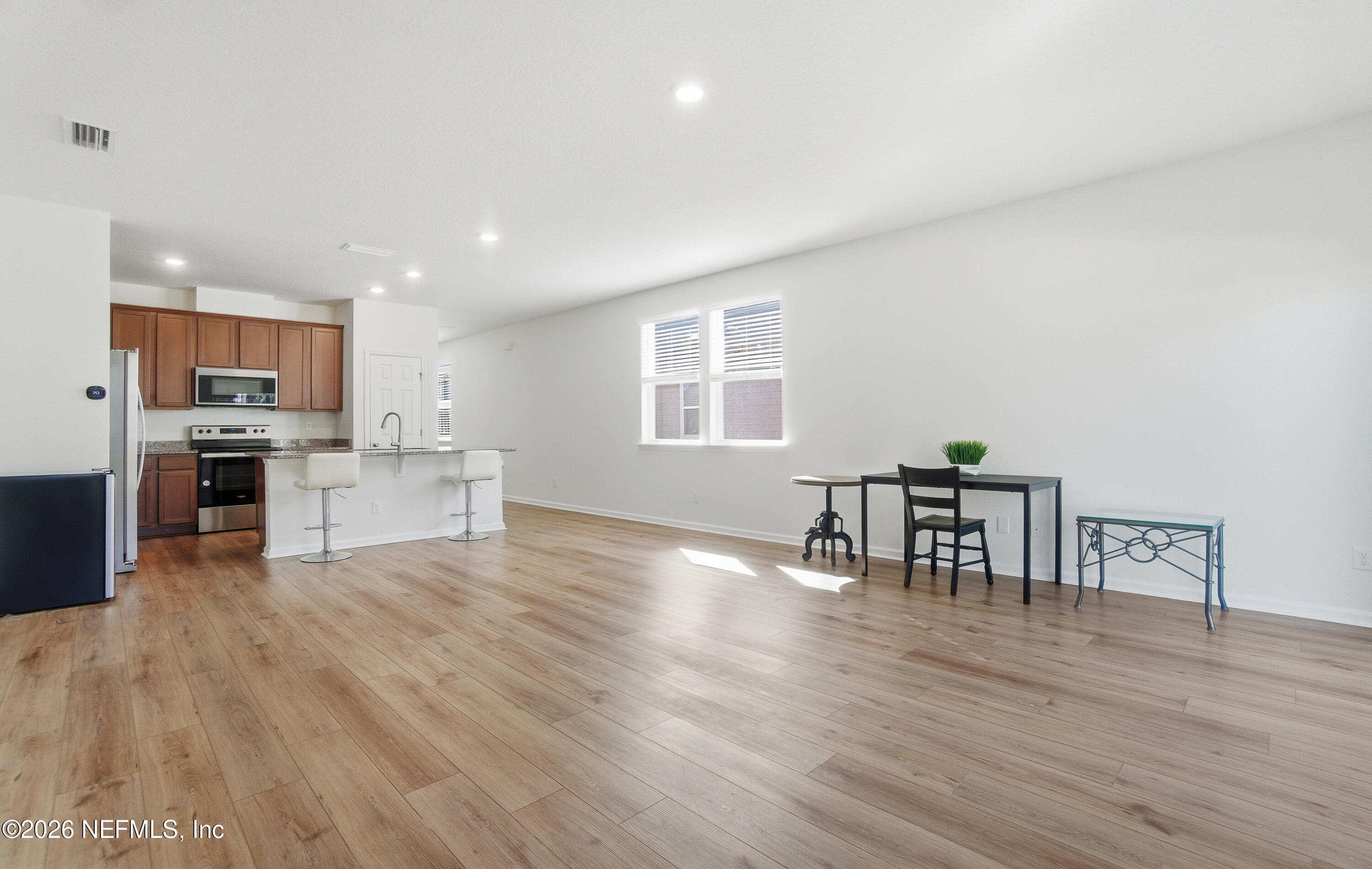 7662 Merchants Way Jacksonville, FL 32222 - Photo 10 of 32 a view of kitchen with table and chairs