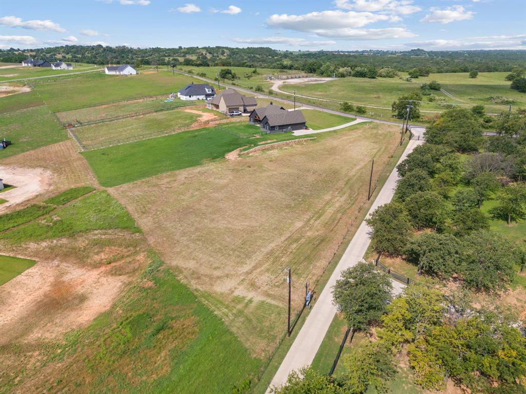 1052 North Agnes Road Springtown, TX 76082 - Photo 3 of 16 a view of lake with mountain