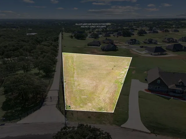 a view of a lake with a big yard