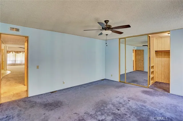 a bathroom with a double vanity sink mirror and shower