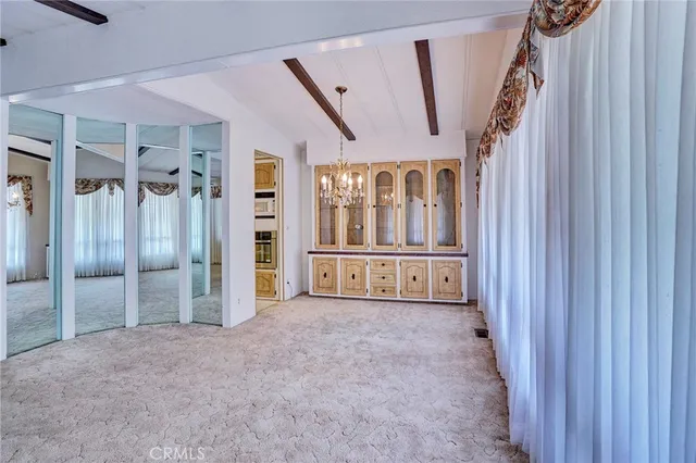 a view of a livingroom with a chandelier