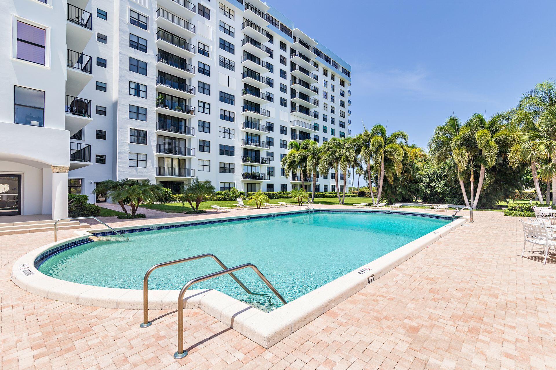 3800 Washington Road, Unit 606 West Palm Beach, FL 33405 - Photo 26 of 27 a view of swimming pool from a patio