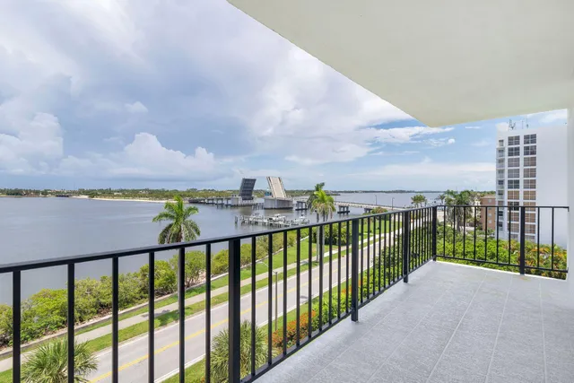 a view of a building with a yard