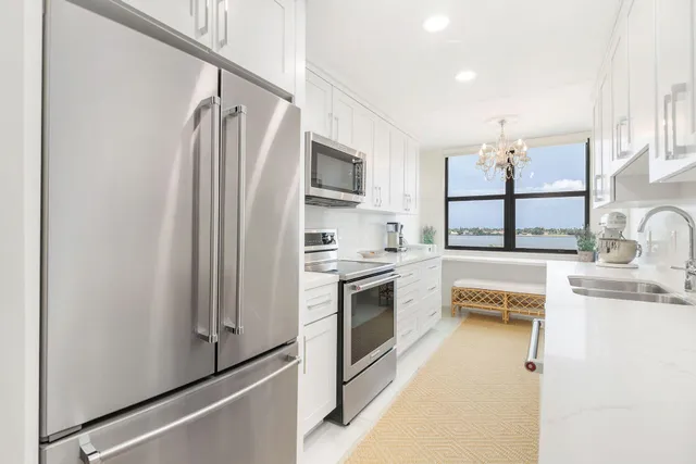 a view of a swimming pool with a lounge chairs