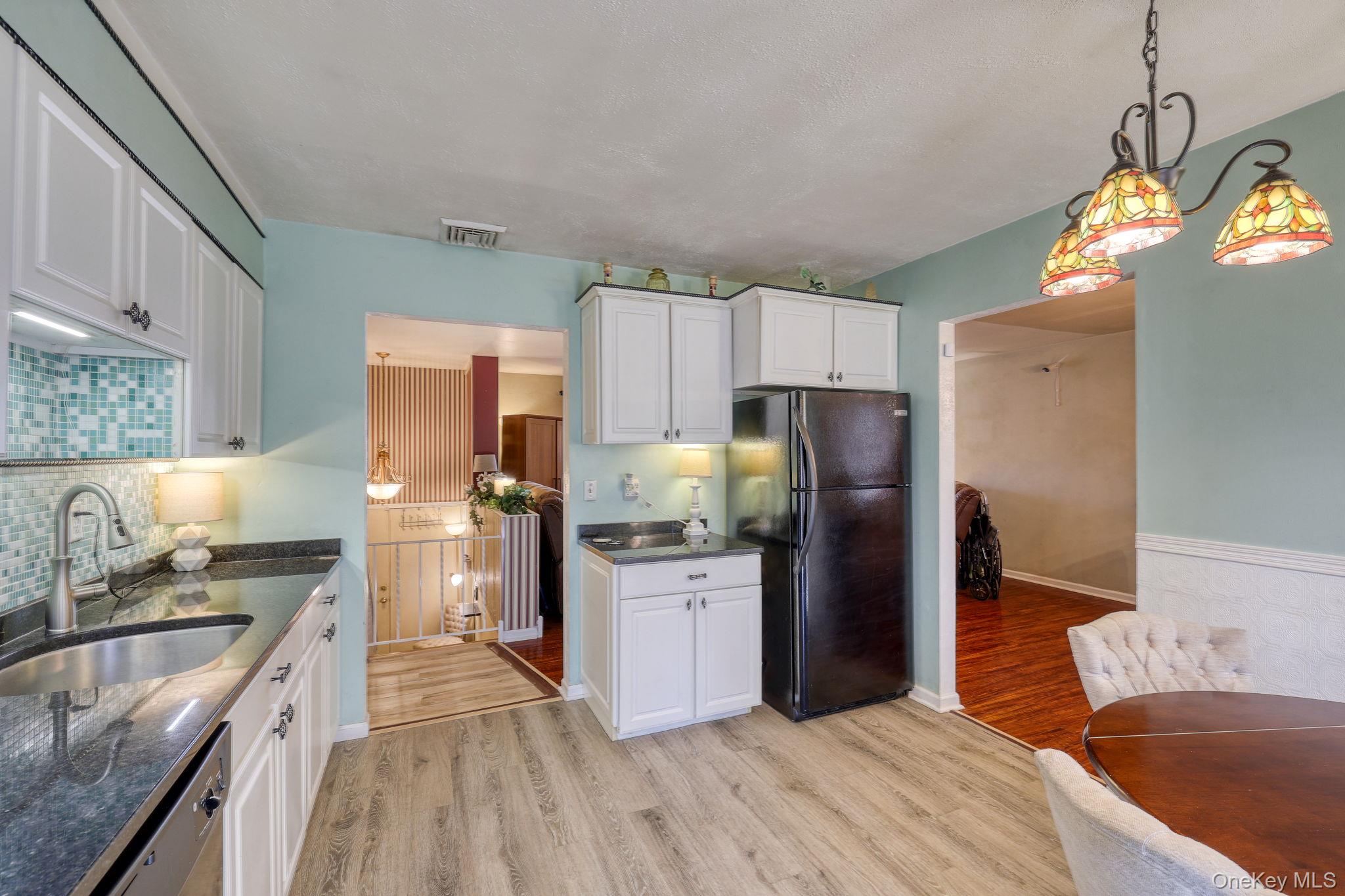1 Townsend Street New Windsor, NY 12553 - Photo 13 of 36 a kitchen with granite countertop a refrigerator stove top oven and sink